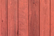 桔红色涂漆木板纹理图片