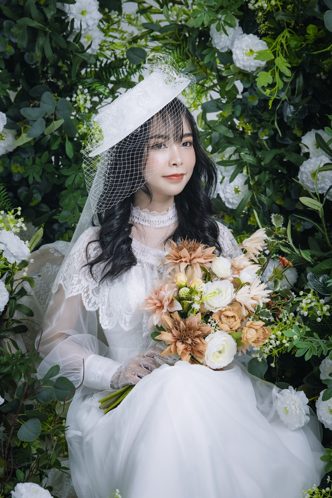 越南白色婚纱美女写真图片