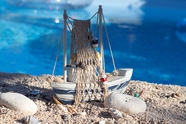 夏日海滩帆船模型摄影图片