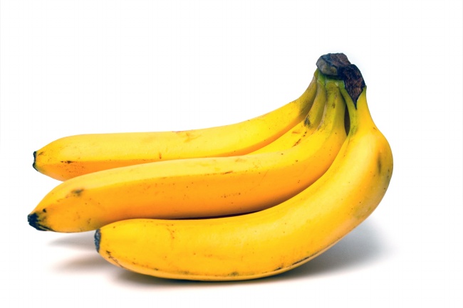 成熟黄色香蕉串图片
