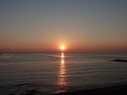 平静海平面日落风景图片