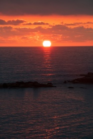 夕阳海上日落图片