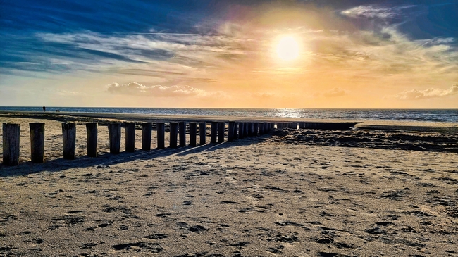 黄昏海岸沙滩落日风光摄影图片