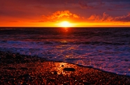 日暮黄昏海平线落日余晖图片