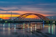 日暮黄昏城市桥梁建筑摄影图片