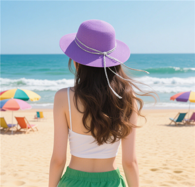 夏日海边沙滩戴帽美女背影写真图片