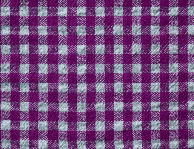 紫色格子布料背景图片