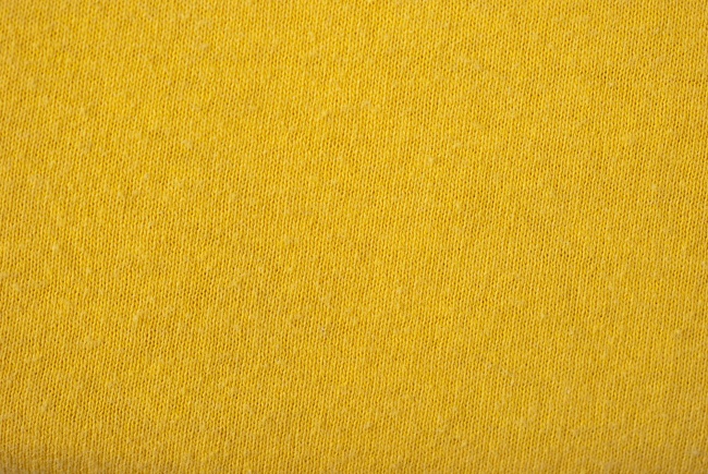 土黄色羊毛衫面料背景图片