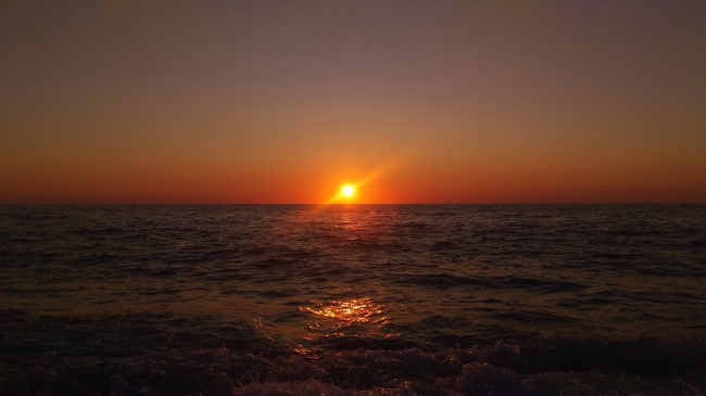 爱奥尼亚海日落美景图片